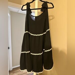 Black Sleeveless Dress with White Trim